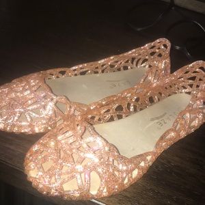 Pink sparkly gel flats